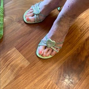 Dezario Green and rhinestone slide in sandals.